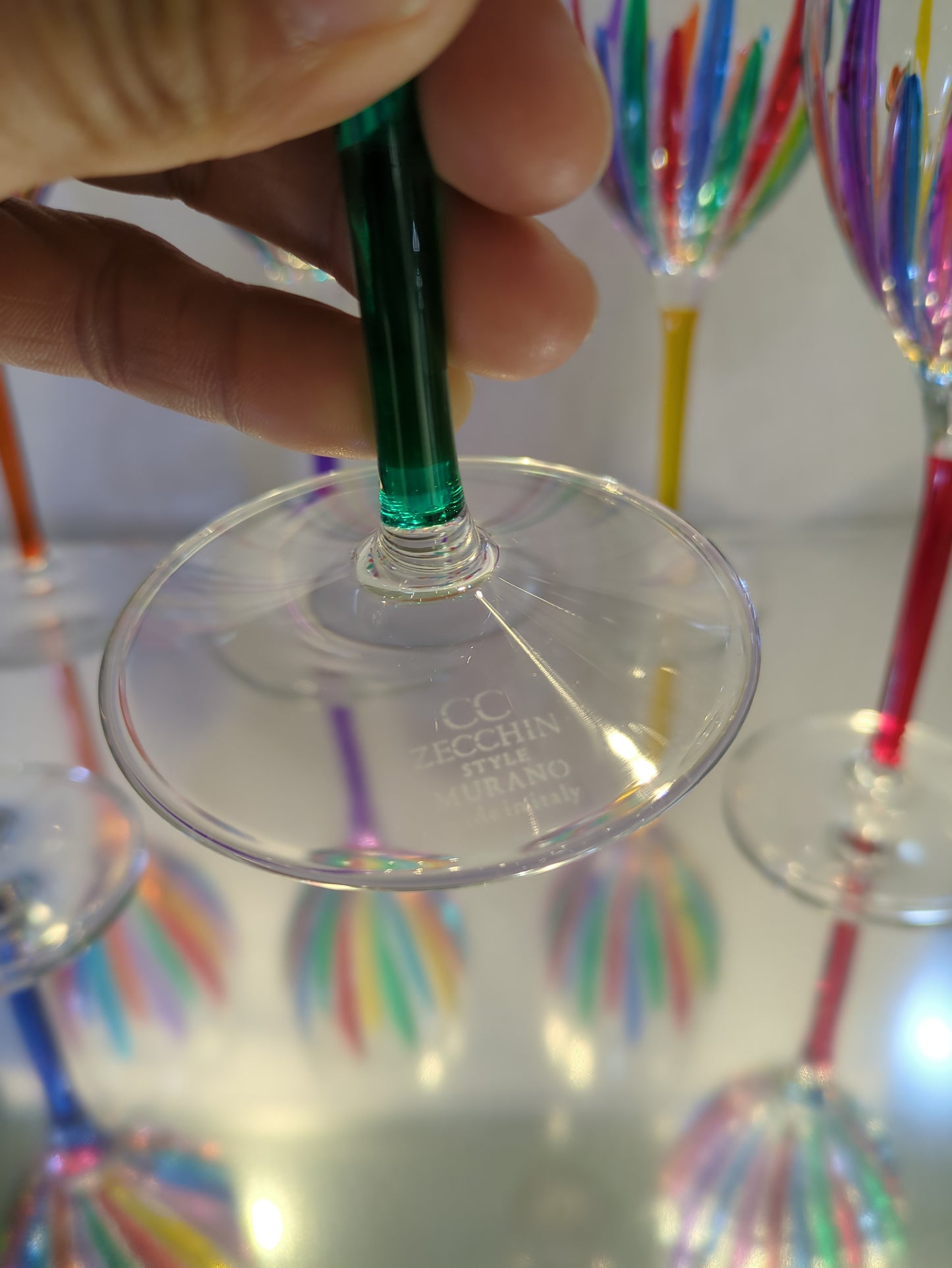 A glass with green stem showing.