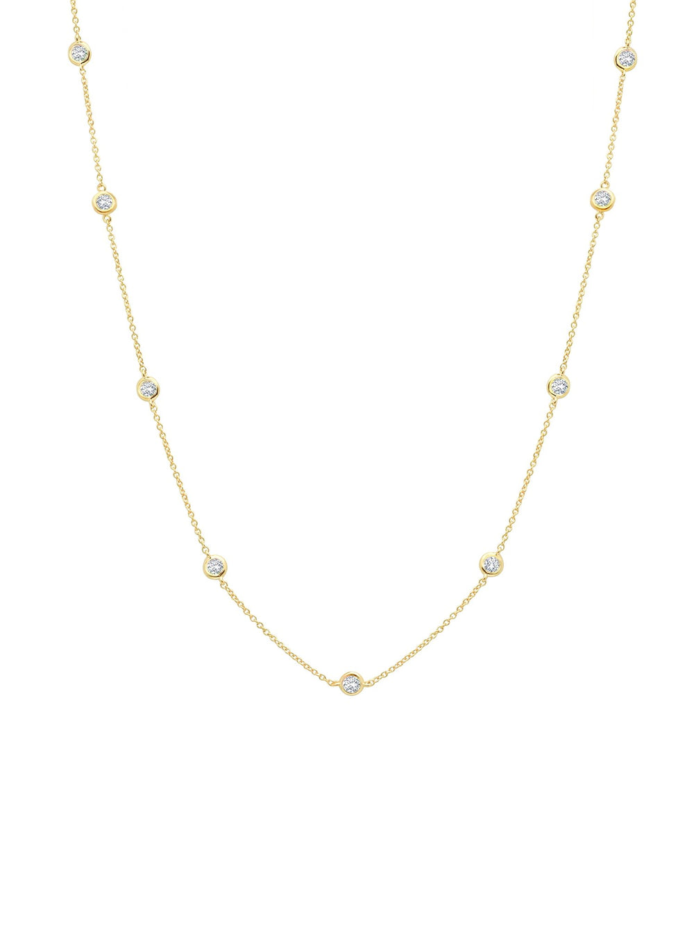 A 36-inch gold-tone necklace with bezel set cubic zirconia stones.