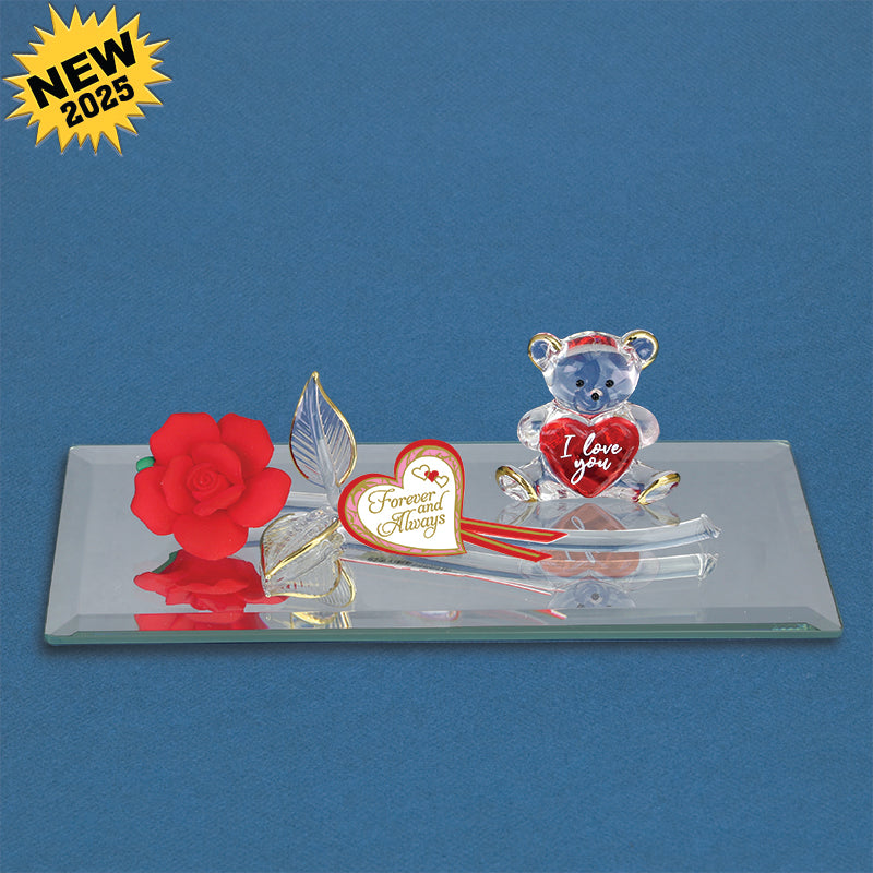 Decorative glass piece with a bear, rose, and heart on a blue background