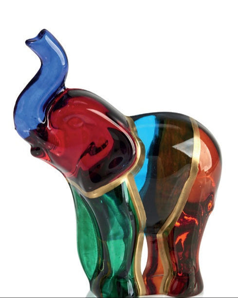 Colorful glass elephant figurine on a white background