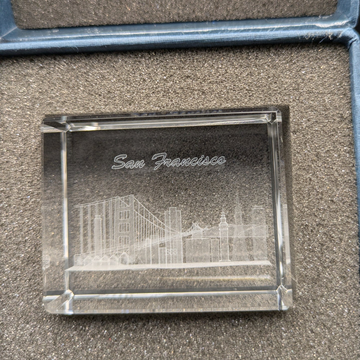 Crystal paperweight with 'San Francisco' engraving in a blue box