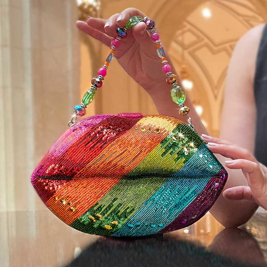 A model holding beaded chain.