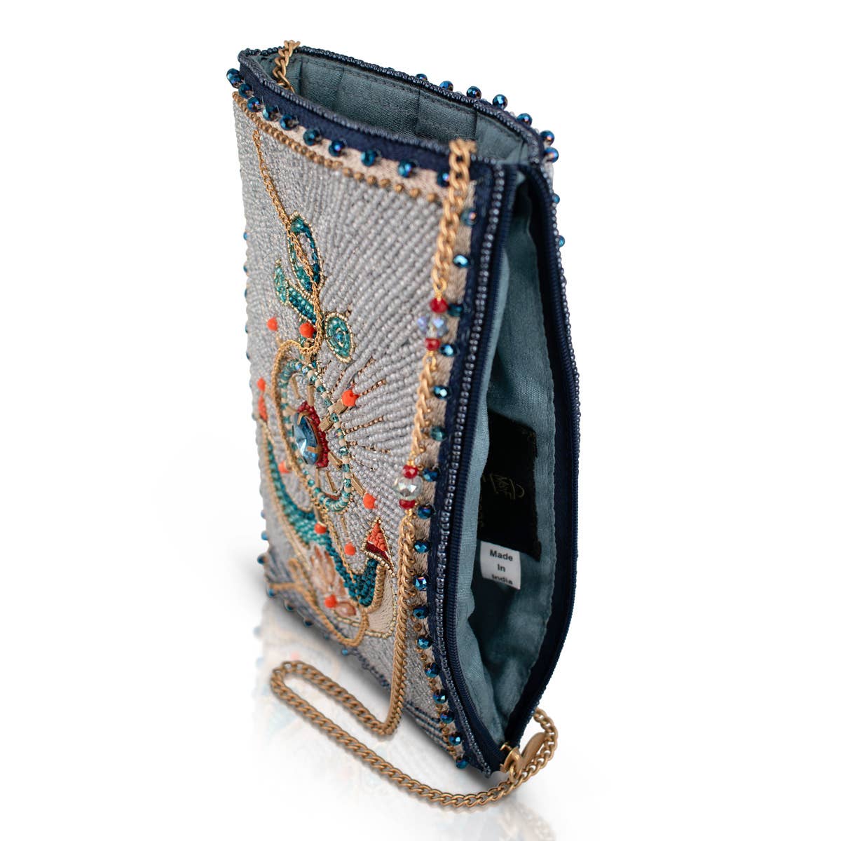 Decorative clutch bag with beaded details on a white background