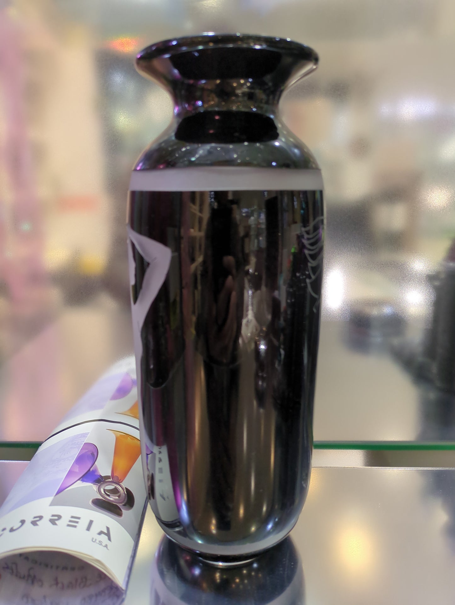 Close-up of a wine bottle with a blurred background