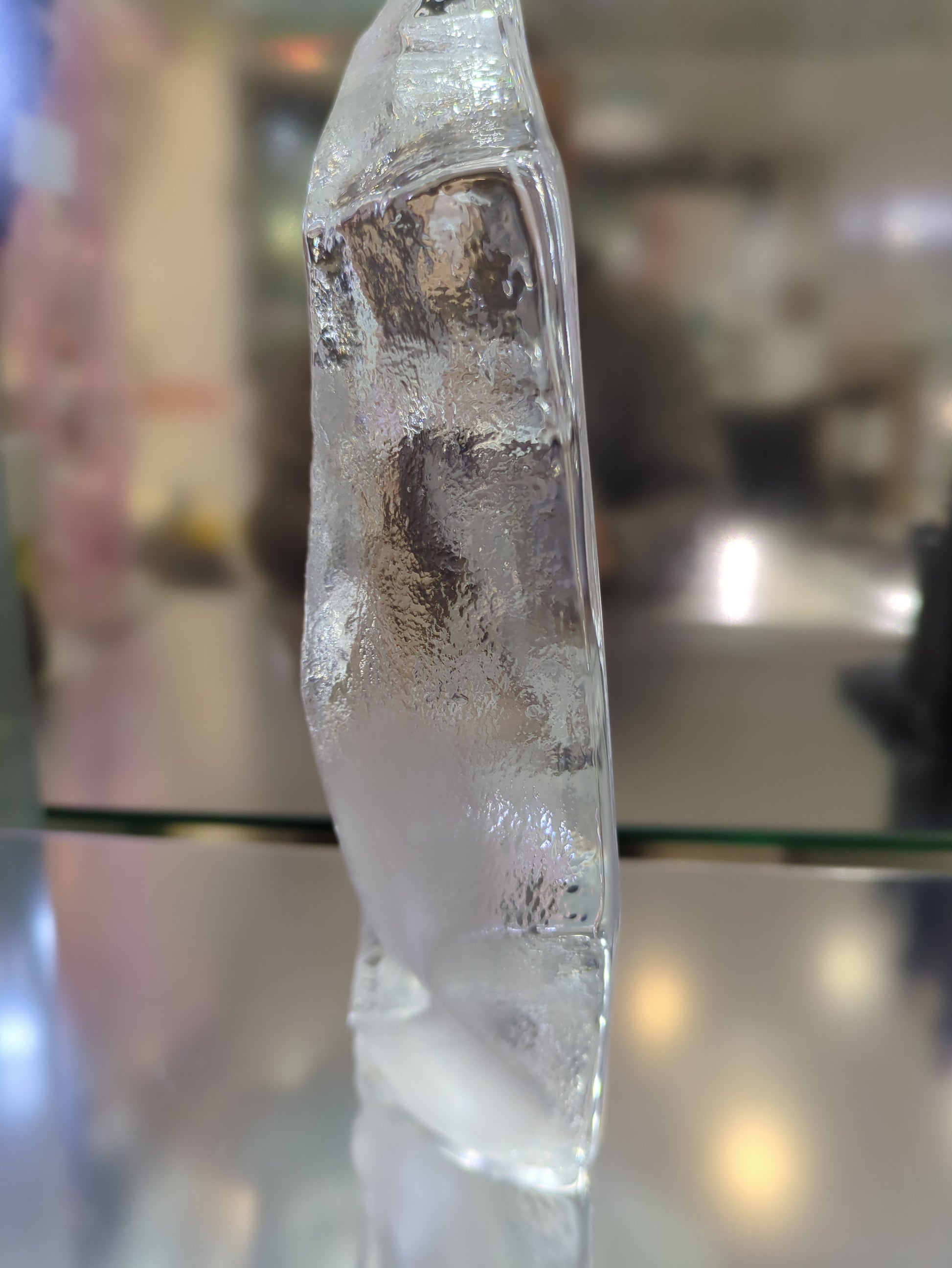 Close-up side of a crystal with a blurred background