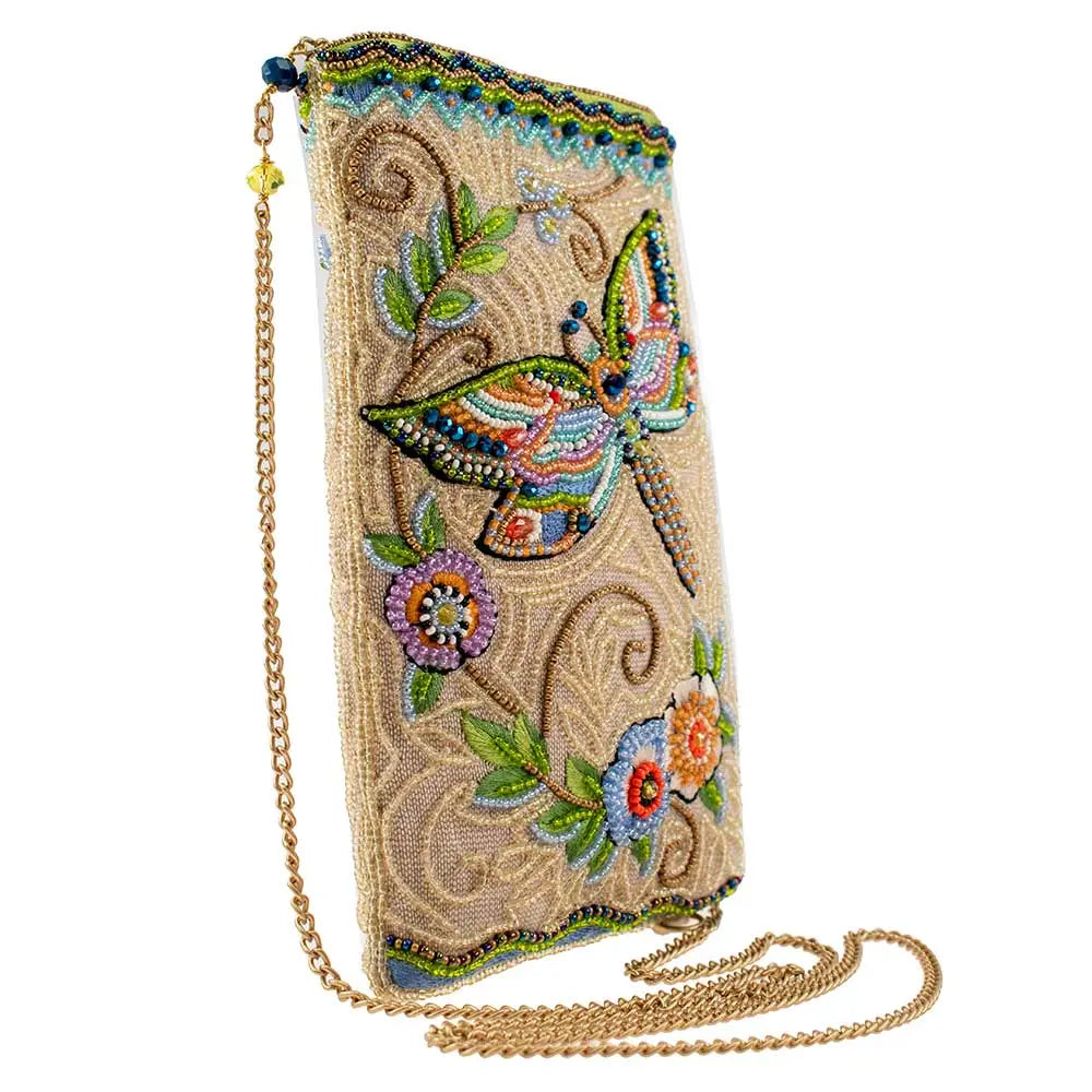 Decorative clutch bag with butterfly design on a white background