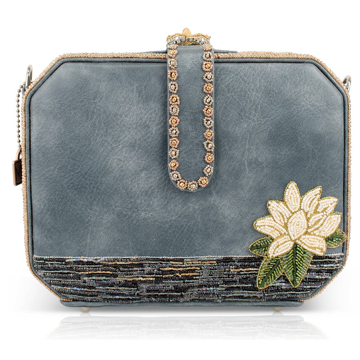 Blue handbag with floral design and decorative handle on a white background