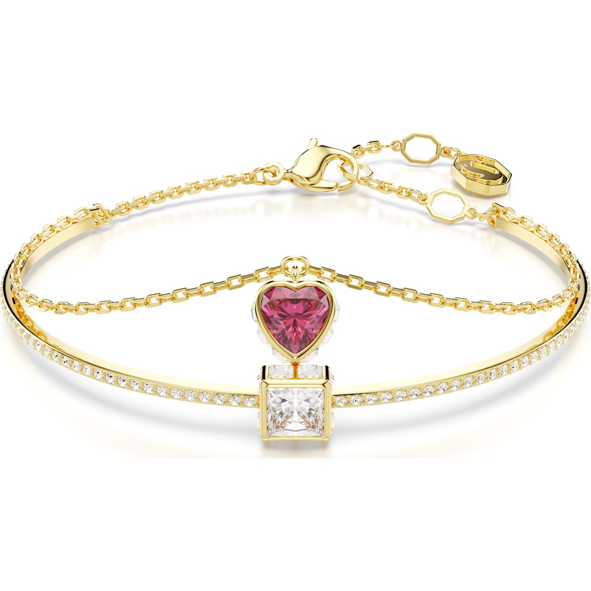 A gold-tone plated bangle bracelet with a red heart-shaped centerpiece and crystal embellishments.
