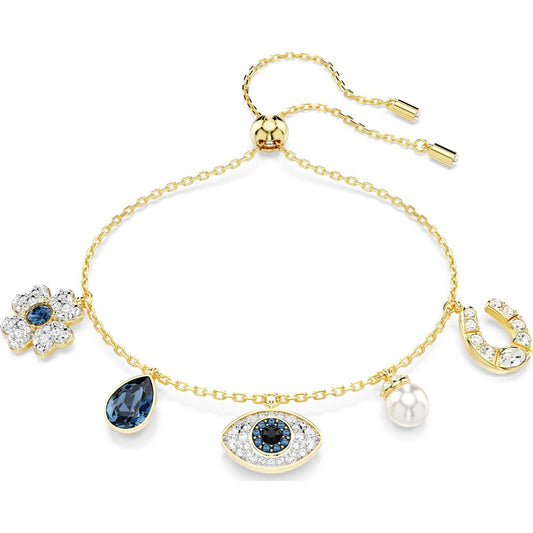 A gold-tone plated bracelet with a series of charms including a clover, a blue eye, and a horseshoe, with blue and clear crystals.