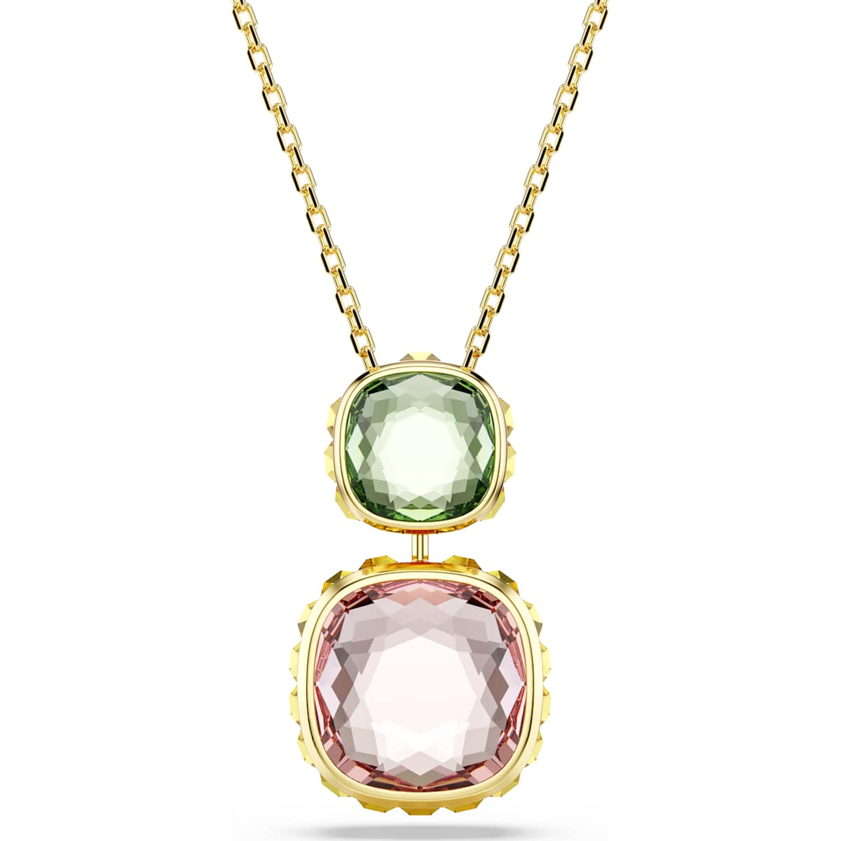 A gold-tone plated Chroma Twist pendant with a green and pink reversible design, featuring Swarovski Recreated crystals.