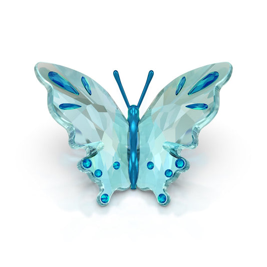Blue butterfly-shaped object on a white background