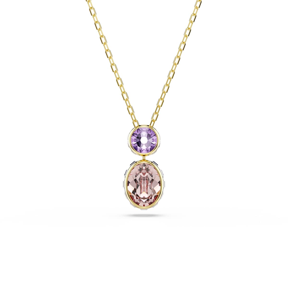 Gold tone necklace with a pink and purple gemstone pendant on a white background