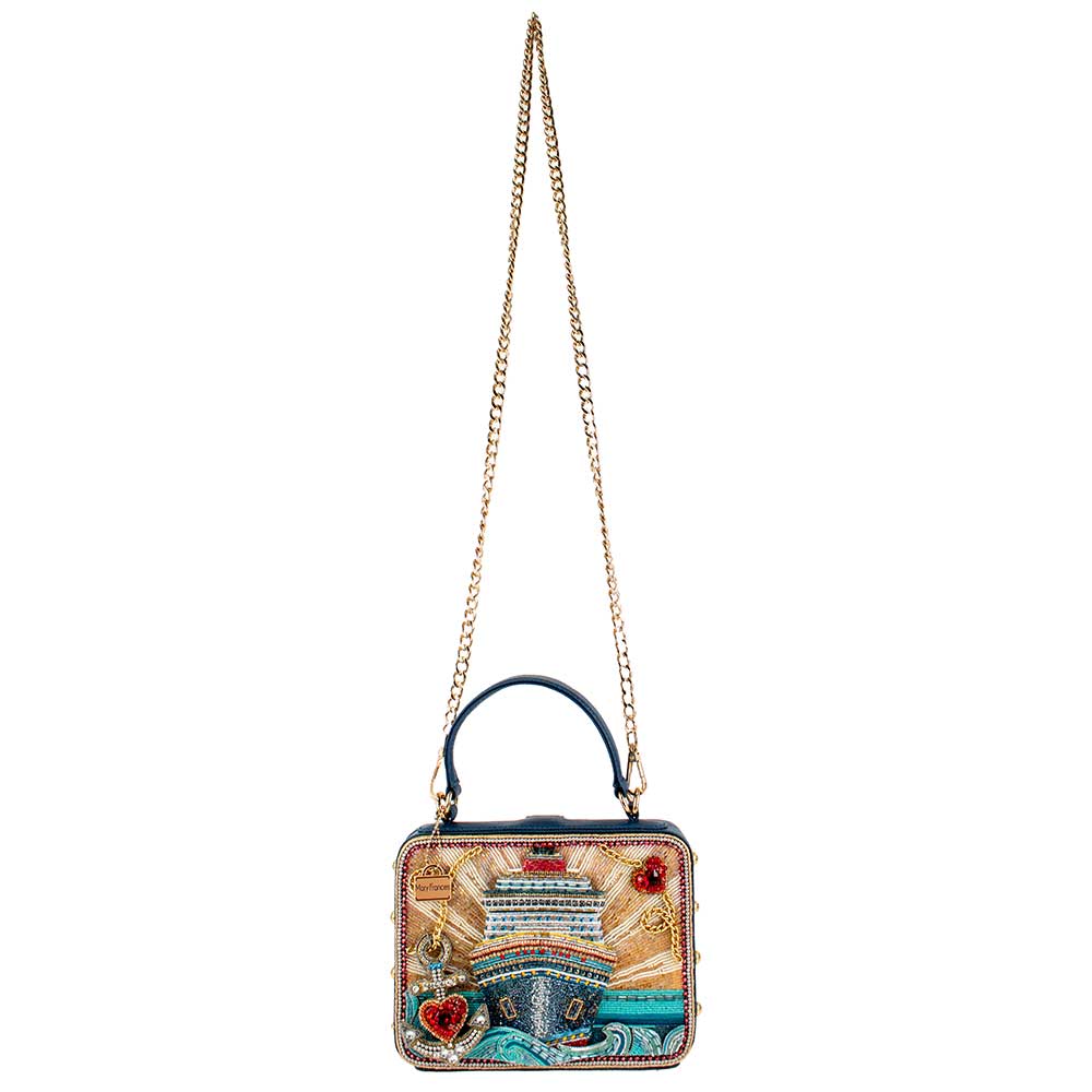 Decorative handbag with a chain strap on a white background