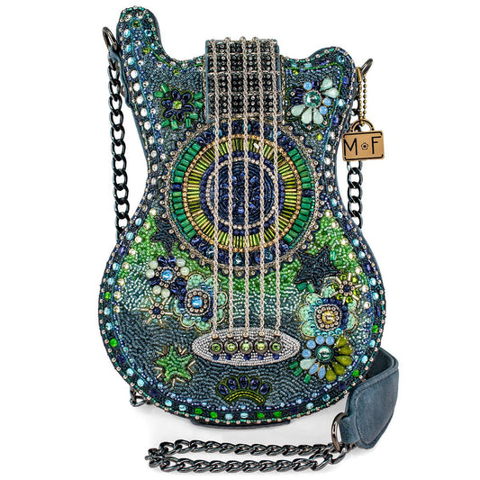 A beaded crossbody handbag designed to resemble a guitar, with intricate blue and green patterns, and a chain strap.