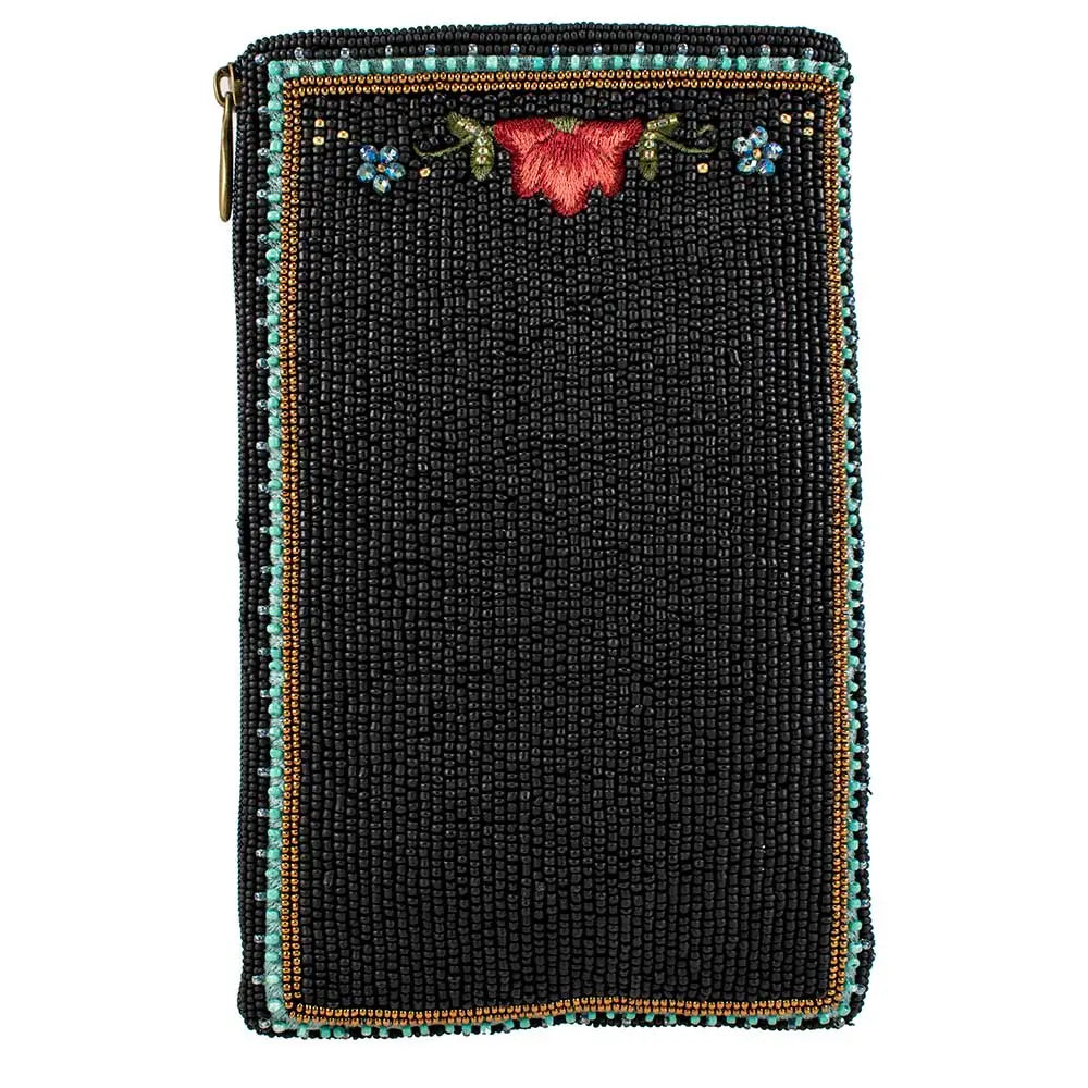 Black beaded pouch with colorful embroidery on a white background