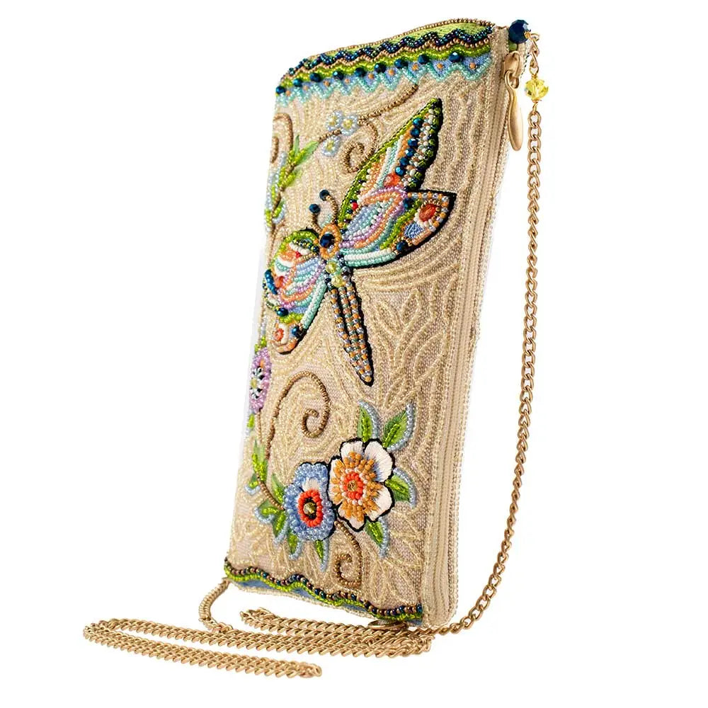 Decorative handbag with floral and butterfly patterns on a white background