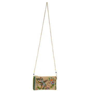 Floral embroidered clutch bag with a strap on a white background