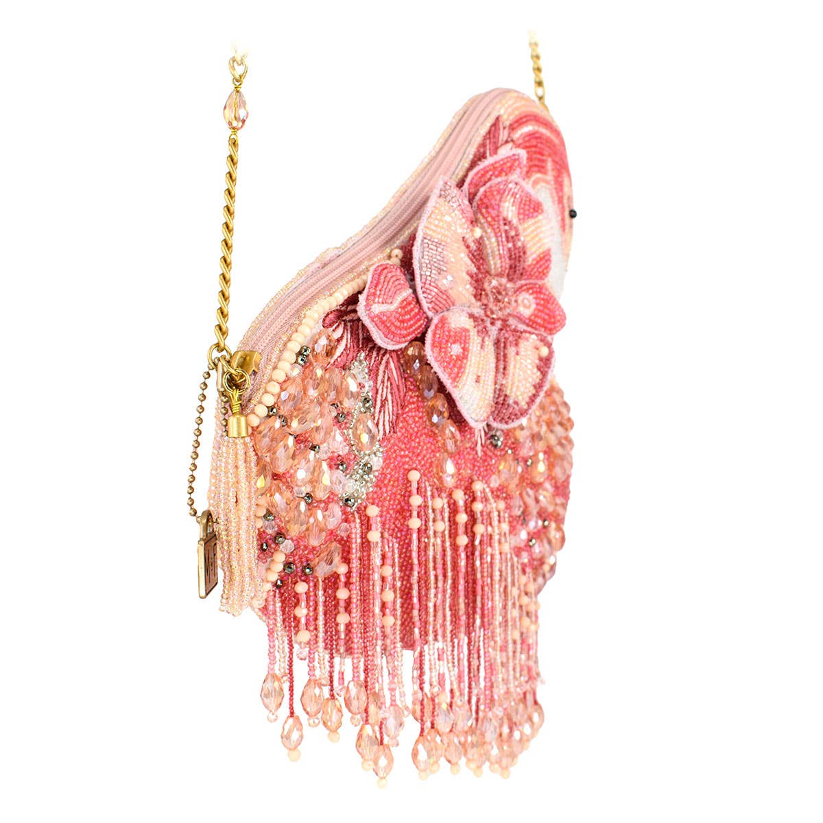 Pink beaded handbag with floral design and gold chain on a white background