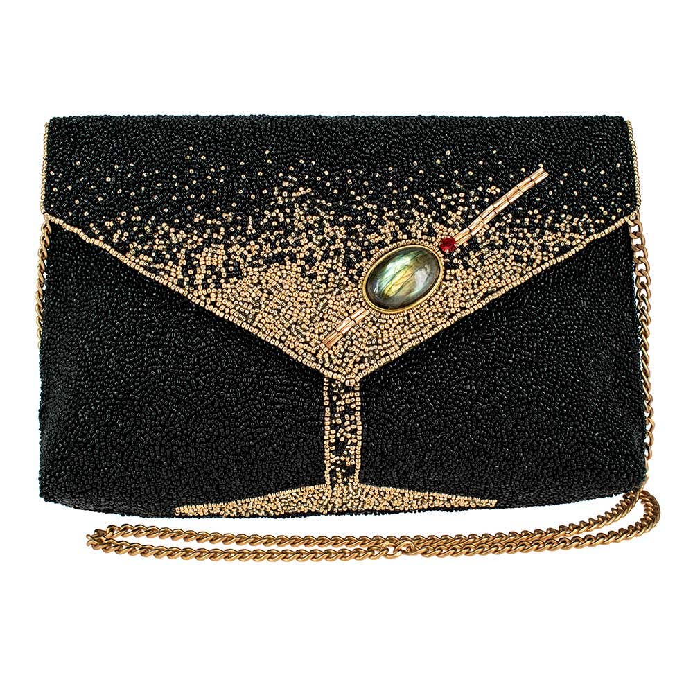 Black beaded clutch with gold chain on a white background