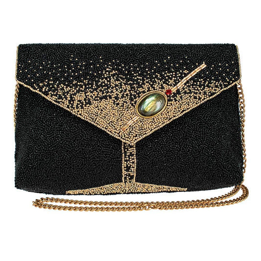 Black beaded clutch with gold chain on a white background