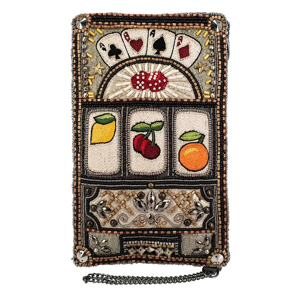 A beaded crossbody phone bag designed to resemble a slot machine with various symbols, including cards and fruits, displayed on the front.