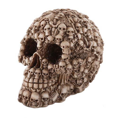 Decorative skull with intricate designs on a white background