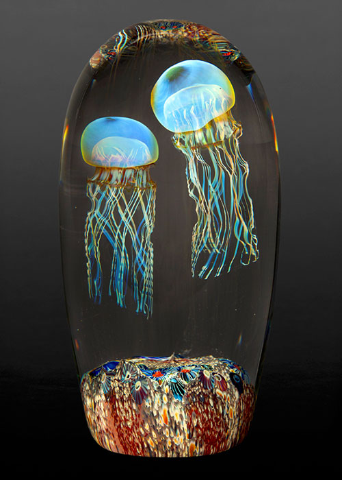 Glass jellyfish design on a dark background