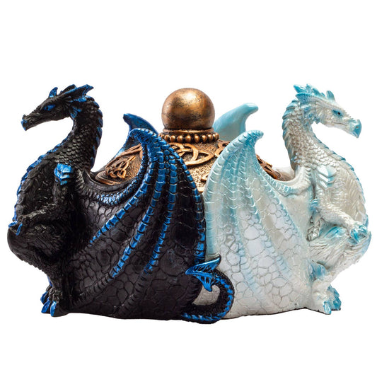 Decorative teapot with black and blue dragon on one side and white and blue dragon on the other, against a white background.