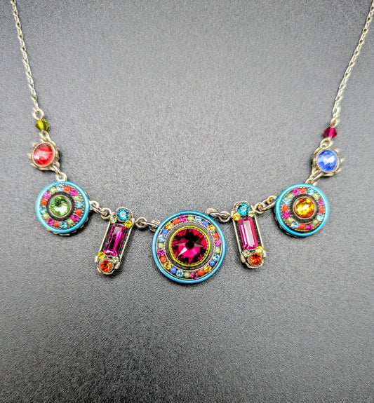 Multi color Firefly necklace on black background.