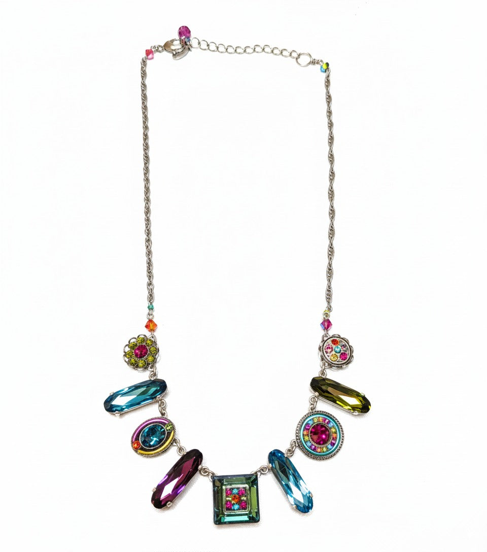 Colorful necklace with multicolored beads on a white background
