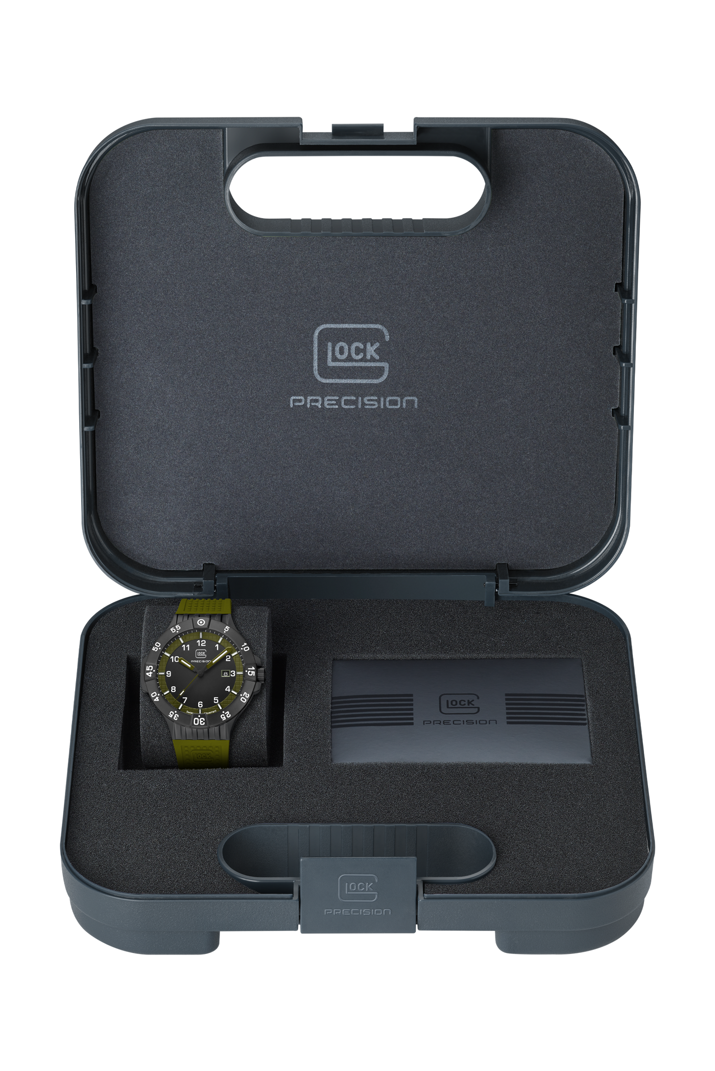 A G-LOCK Precision watch with a dark dial and olive green strap, displayed inside its open black foam presentation case with branded compartments.