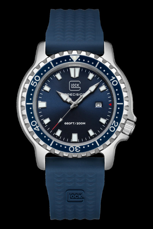 A technical dive watch by Dock Precision with a dark blue dial, matching blue bezel, and a textured blue silicone strap, shown against a solid black background.