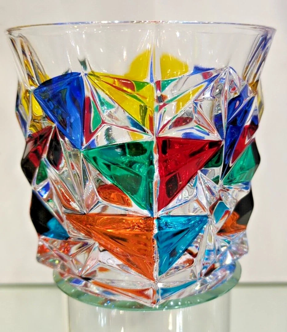 A colorful whisky glass 3.5" height.