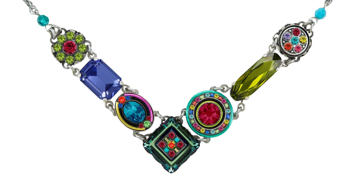 Colorful necklace with various gemstones on a white background