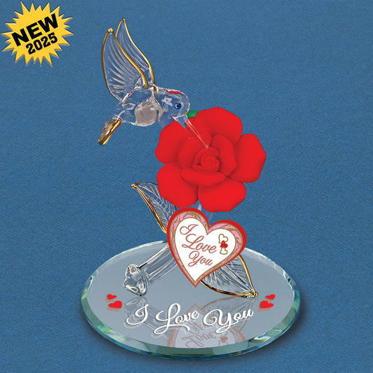 Decorative figurine with a hummingbird, red rose, and 'I Love You' heart on a blue background.