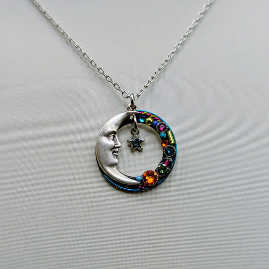 Necklace with a colorful pendant on a mannequin bust against a white background