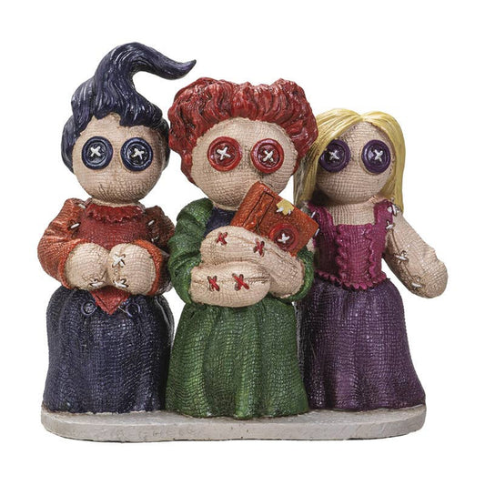 Three colorful voodoo dolls with different hairstyles and outfits on a white background