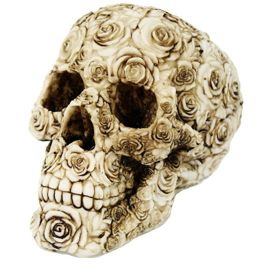 Decorative skull with floral patterns on a white background