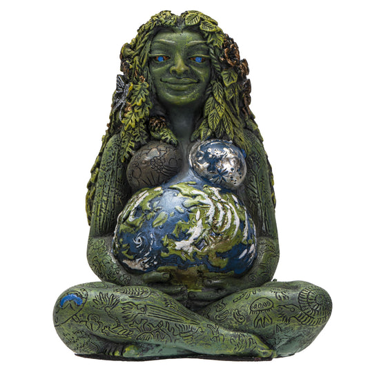 Statue of a green-skinned figure with blue eyes, holding three spherical objects on a white background.