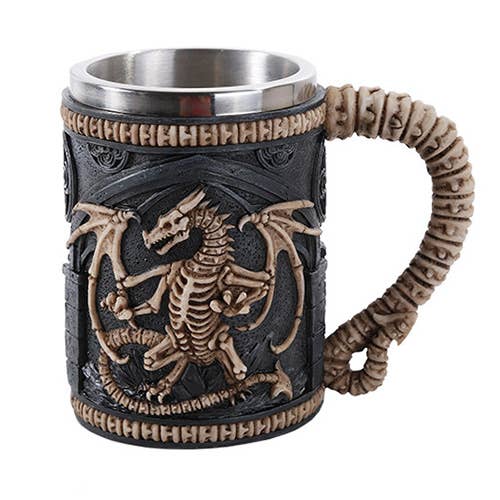 Decorative mug with dragon design and braided handle on a white background