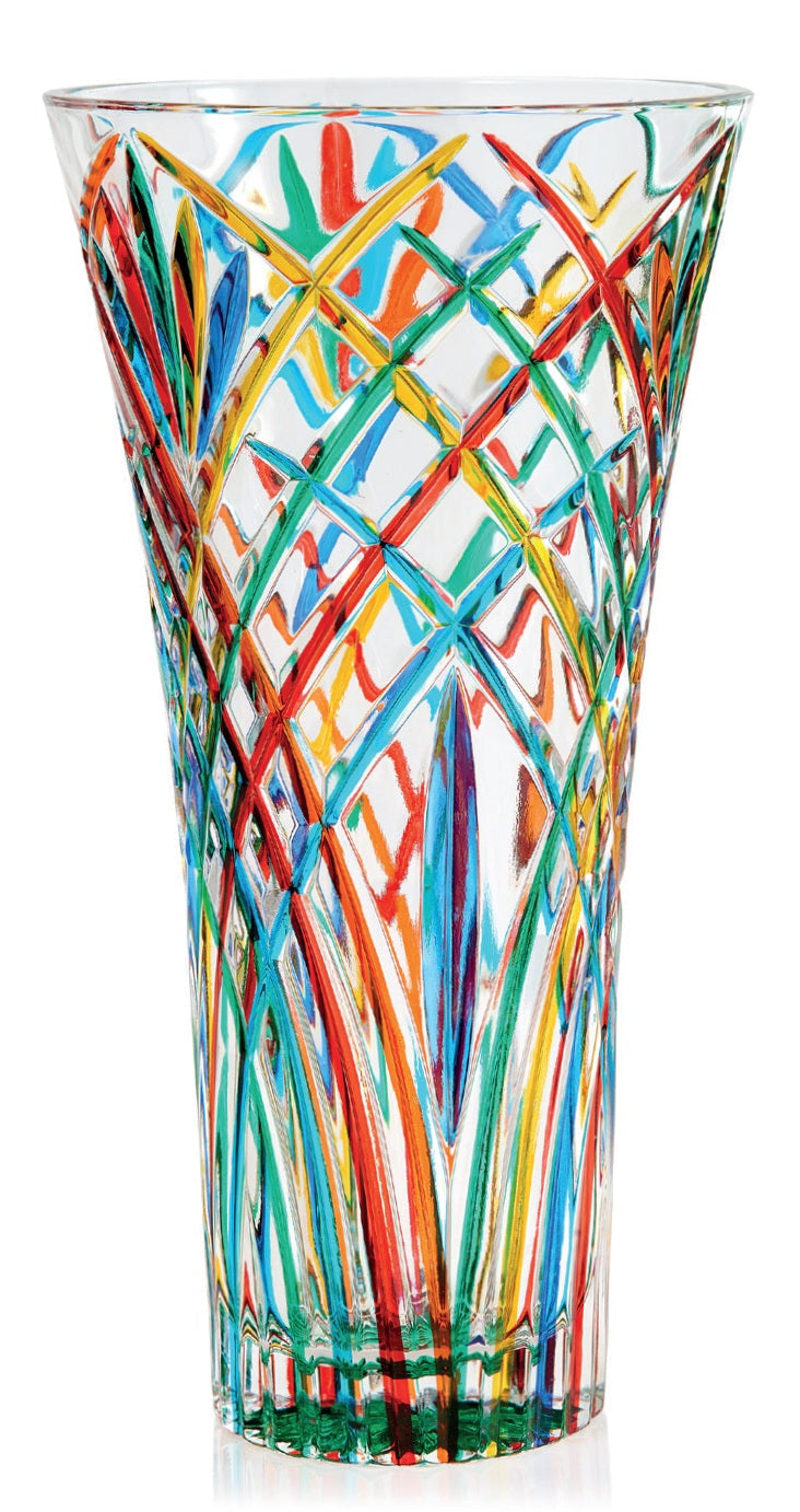 A tall, multicolored, geometric-patterned glass vase.