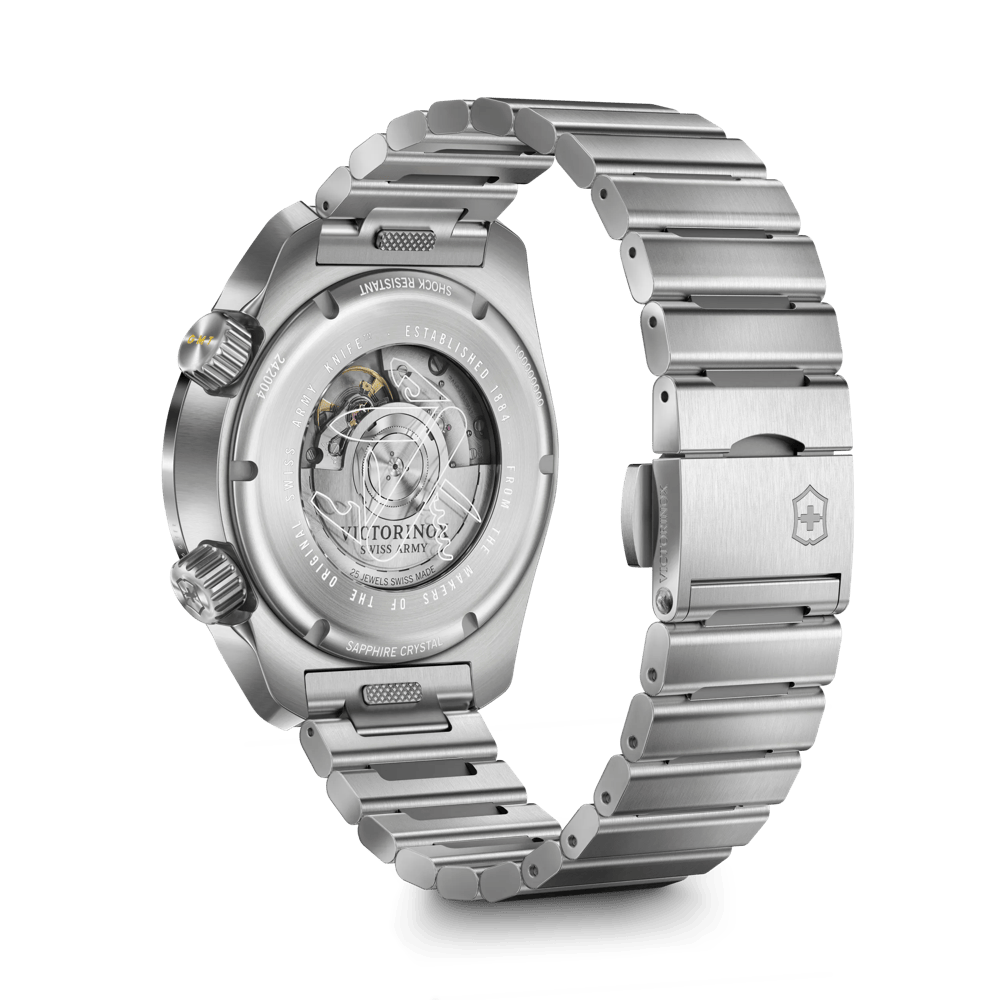 Victorinox stainless steel watch with a transparent back case showing the automatic movement, displayed on a clean white background.