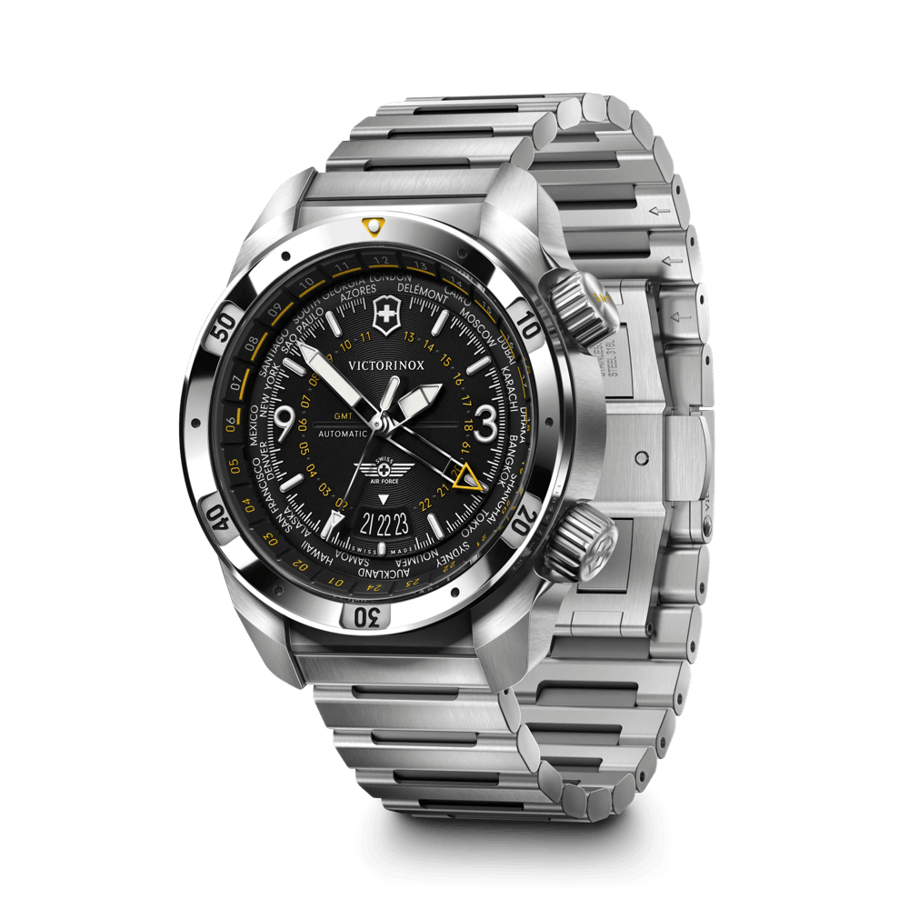 Victorinox stainless steel automatic watch with a black dial, featuring yellow and white details, a rotating bezel, and a multi-link metal bracelet, shown on a white background.