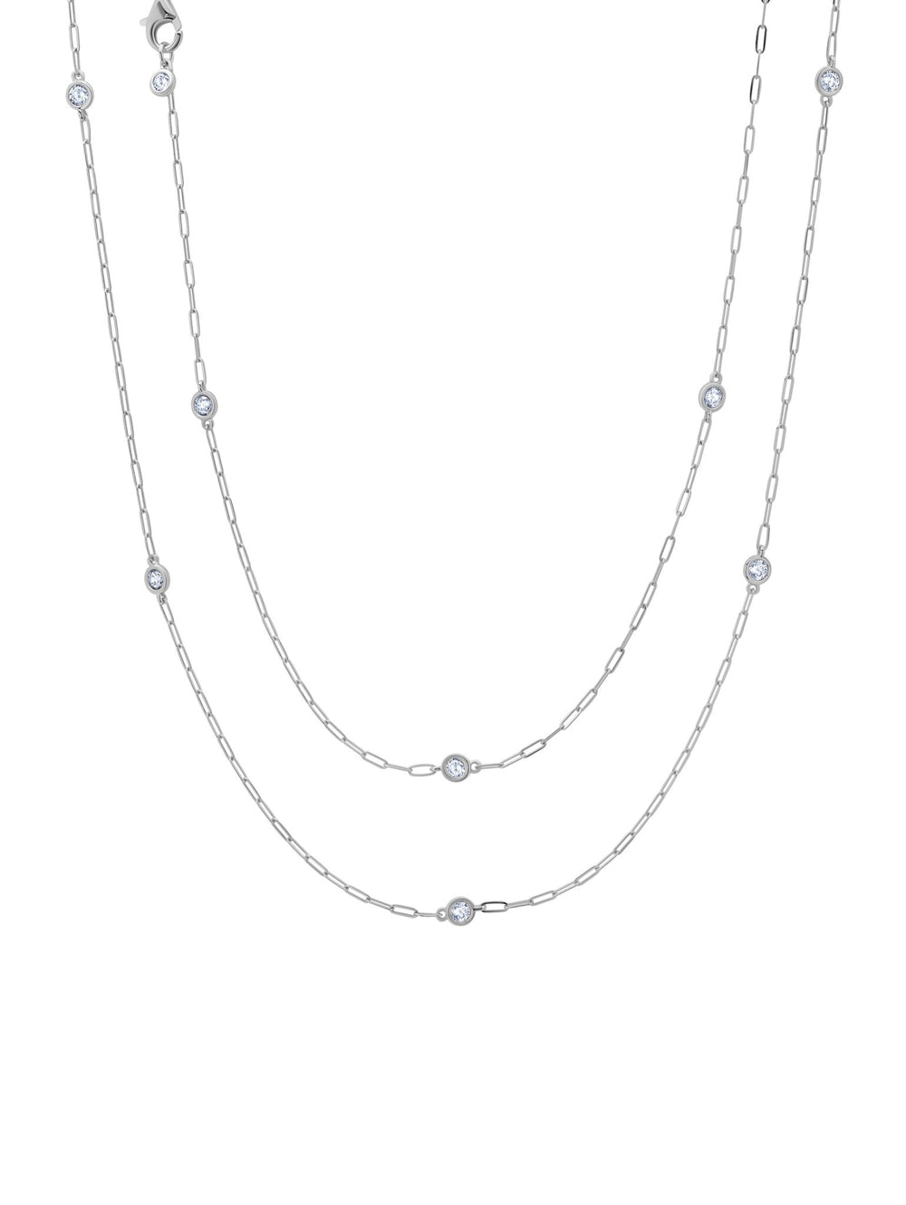 A platinum plated necklace with a paperclip chain and bezel-set cubic zirconia studs, displayed against a white background.
