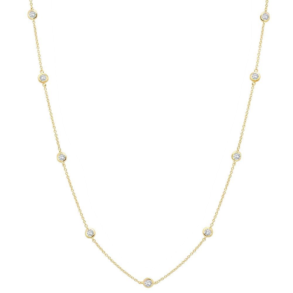 A 16-inch bezel set cubic zirconia necklace in gold, with adjustable length from 16 inches to 18 inches.
