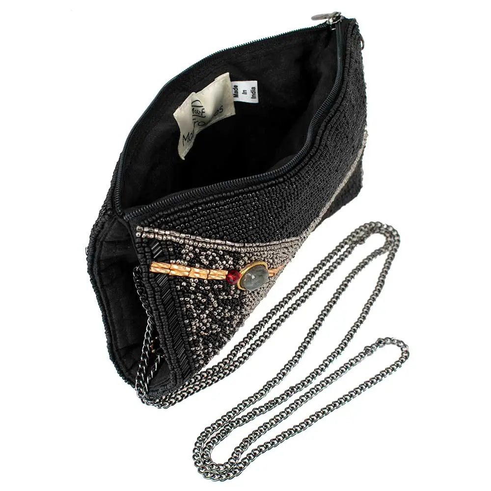 Black beaded handbag with chain strap on a white background