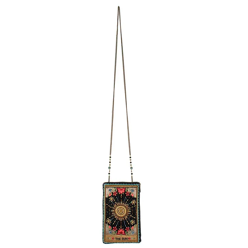 Small rectangular bag with sun design and beaded chain on white background