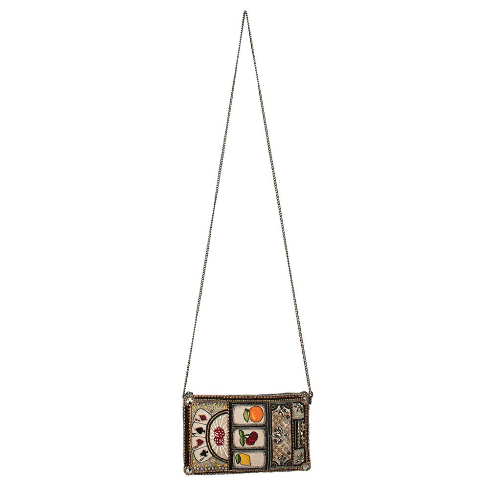 A beaded crossbody phone bag designed to resemble a slot machine with various symbols, including cards and fruits, displayed on the front on chain.