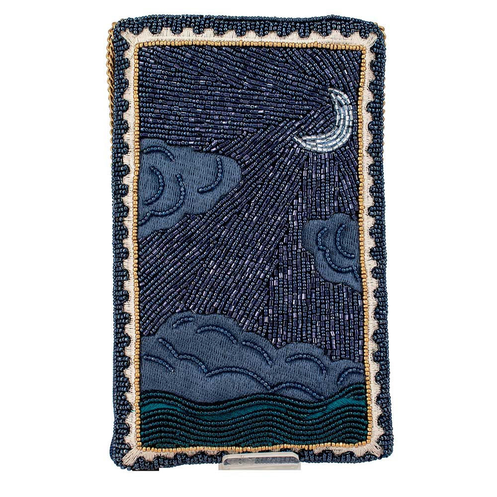 Beaded phone case with moon and cloud design on a white background