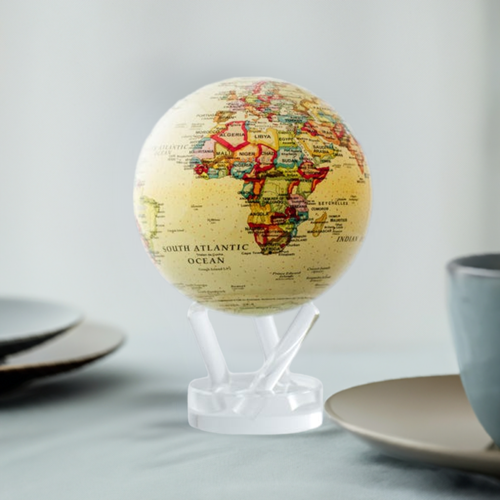 A yellow political map globe in white background.